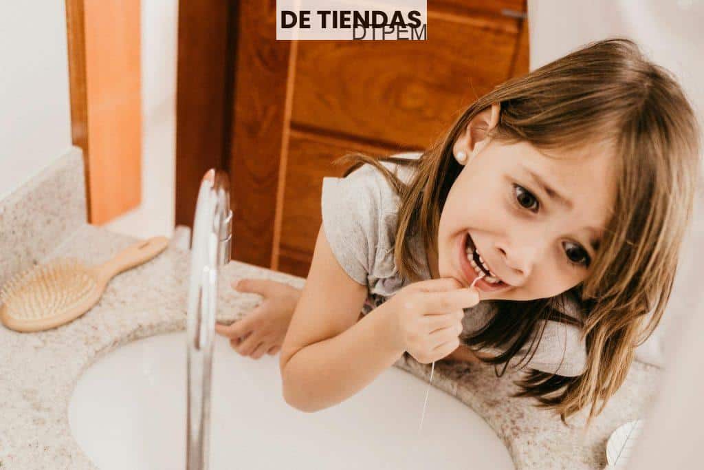 A Girl Flossing her Teeth